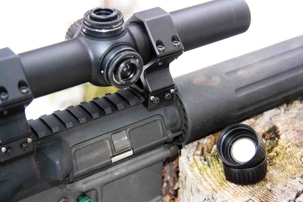 The riflescope tested included an illuminated 4A-IF reticle system. The power is supplied by a lithium coin battery held beneath the left side cap; a spare battery is held securely inside the windage-adjustment cap.